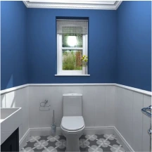 a blue wall wc with a sink, window and toilet.