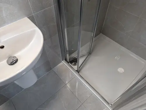 a shower with a glass door